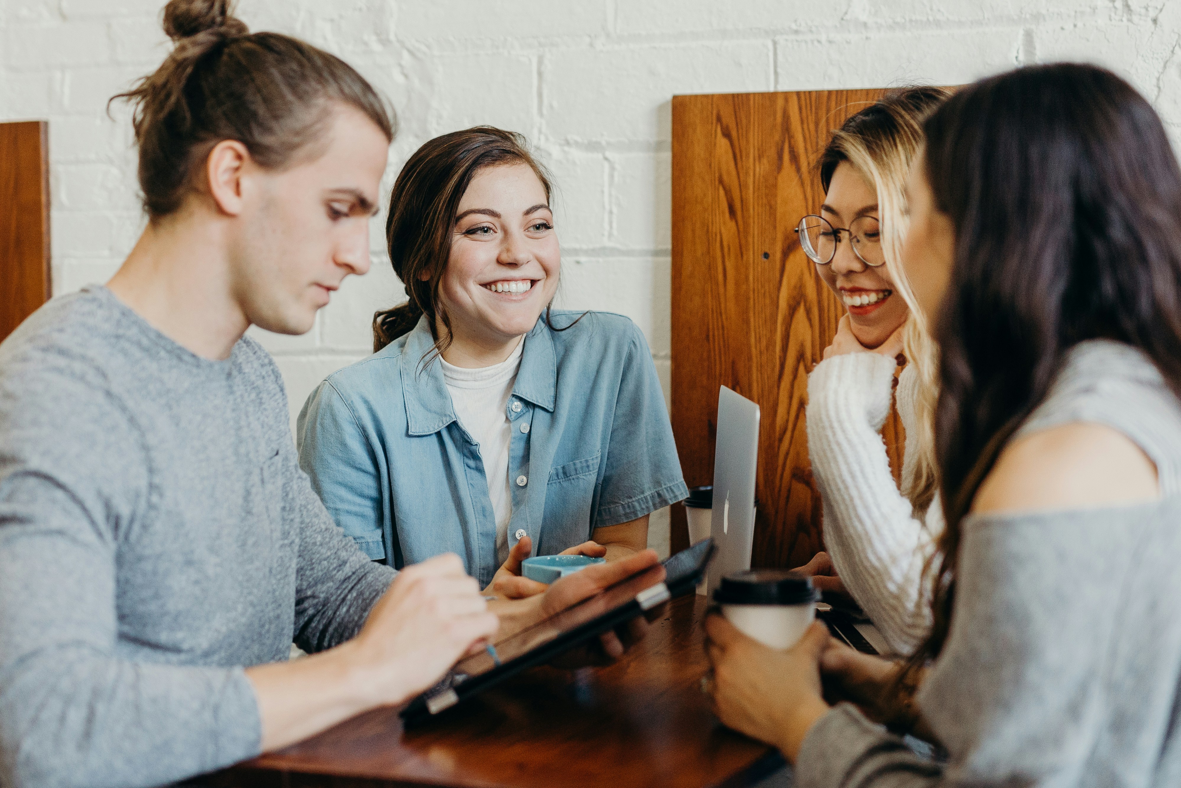 people working around a table 