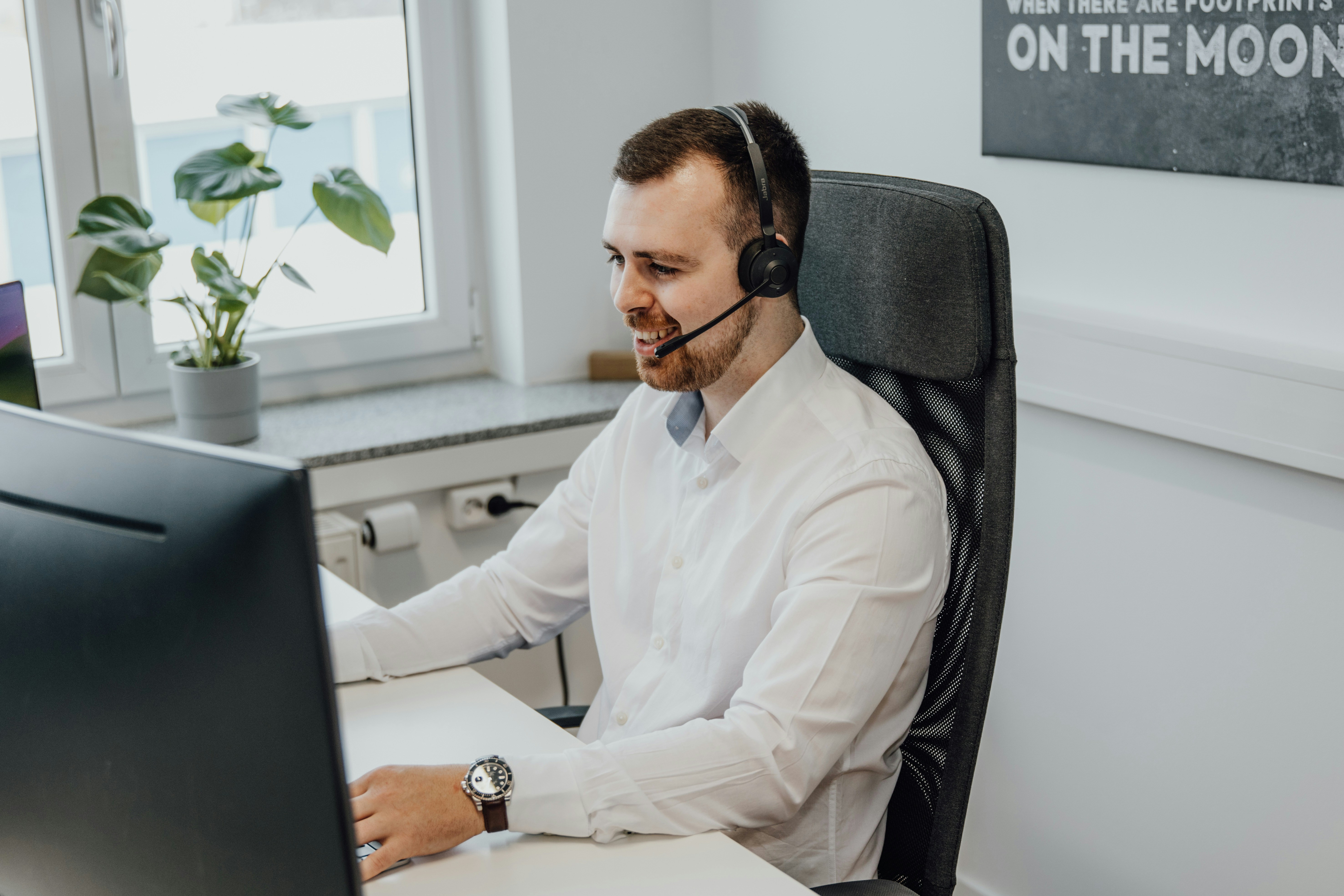 man sitting at desk